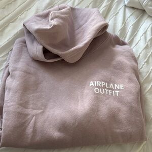 Pink Hoodie with Airplane Outfit Text